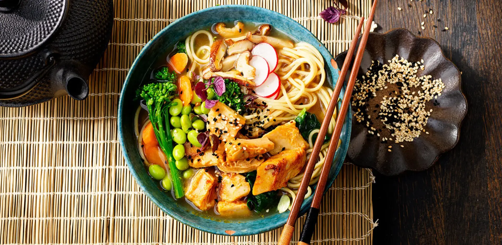 A bowl full of vegetables, protein and carbohydrates.