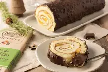 Bûche aux fruits exotiques glaçage chocolat noisettes
