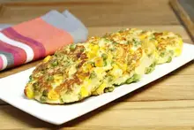 Galettes de pommes de terre petits pois maïs