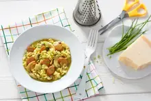 Risotto aux saucisses, jambon et champignons
