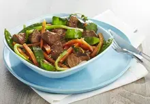 Sauté de porc à la coriandre, gingembre et légumes sautés